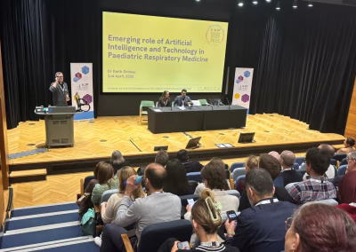 Photo of a speaker at a medical conference