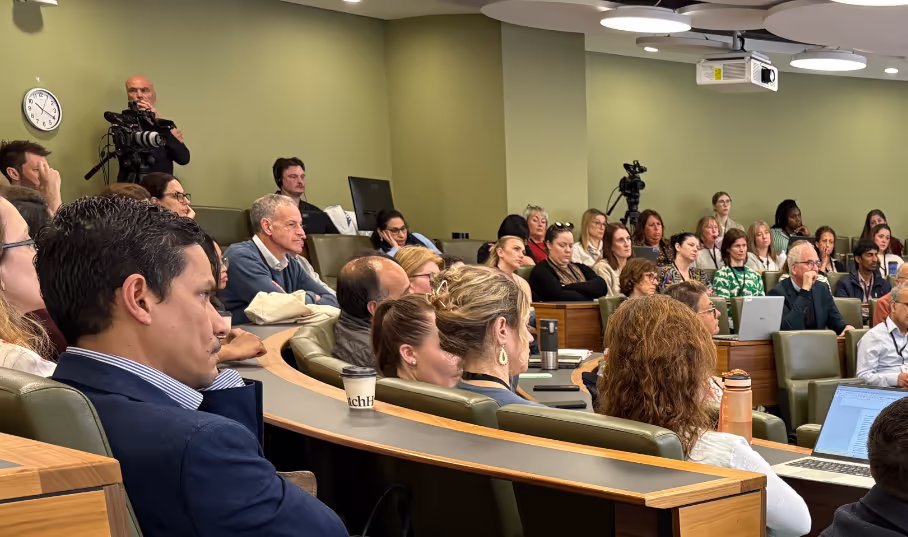 Attendees in a lecture theatre